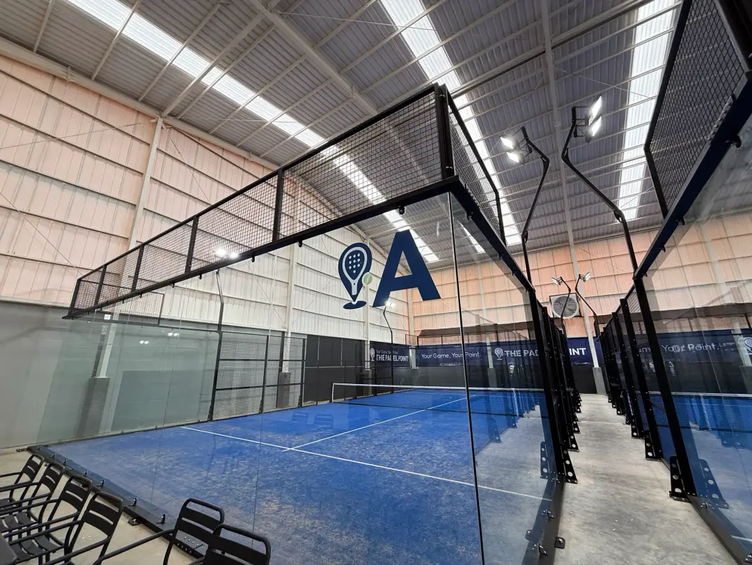 Court A, a panoramic court with blue turf