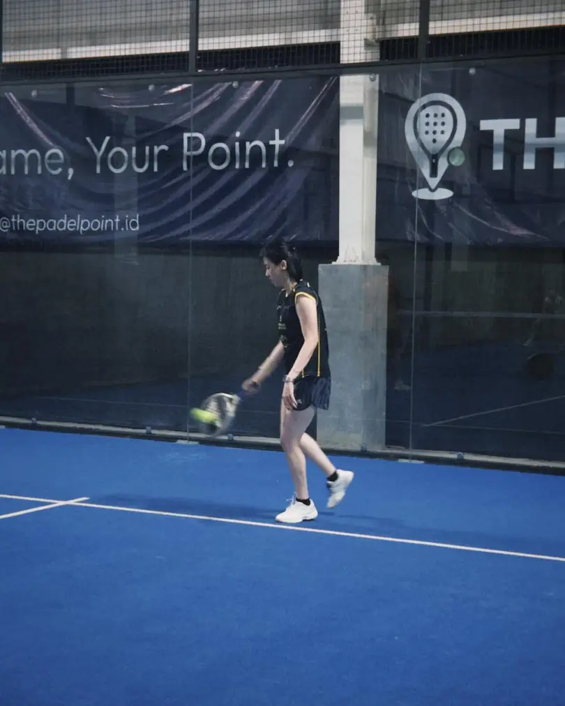 A player hitting a backhand